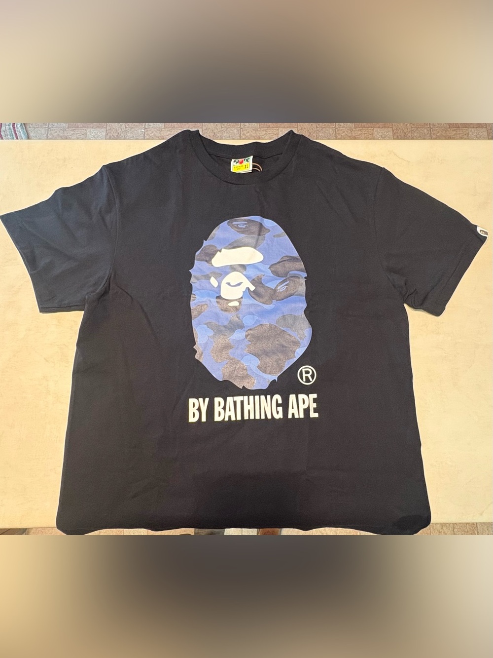 A Bathing Ape Black Tee with Blue Camo Ape Head